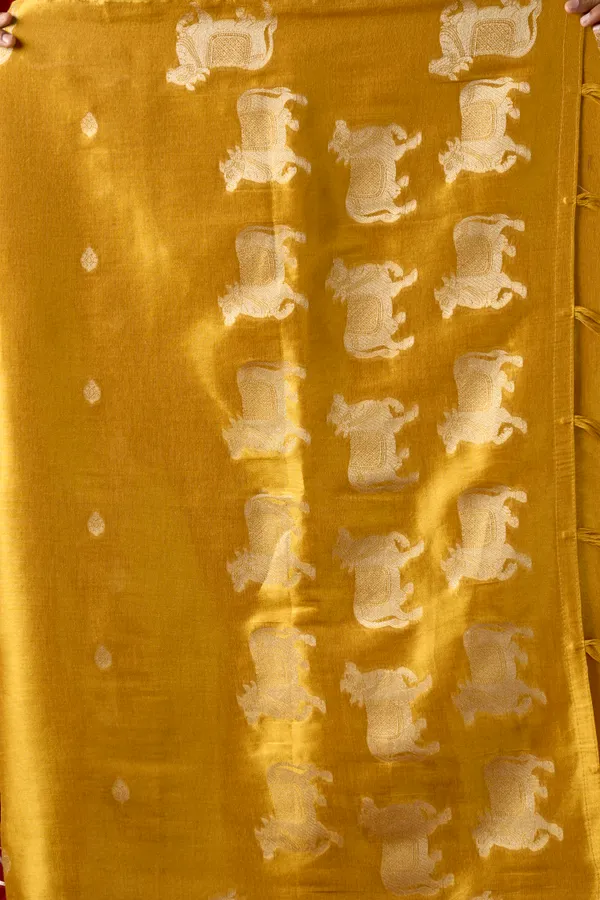 Yellow_Heavy_Tissue_Cow_Butta_Tassel_Saree_For_Women