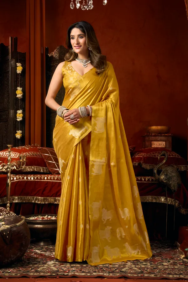 Yellow_Heavy_Tissue_Cow_Butta_Tassel_Saree_For_Women