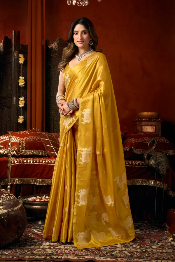 Yellow_Heavy_Tissue_Cow_Butta_Tassel_Saree_For_Women