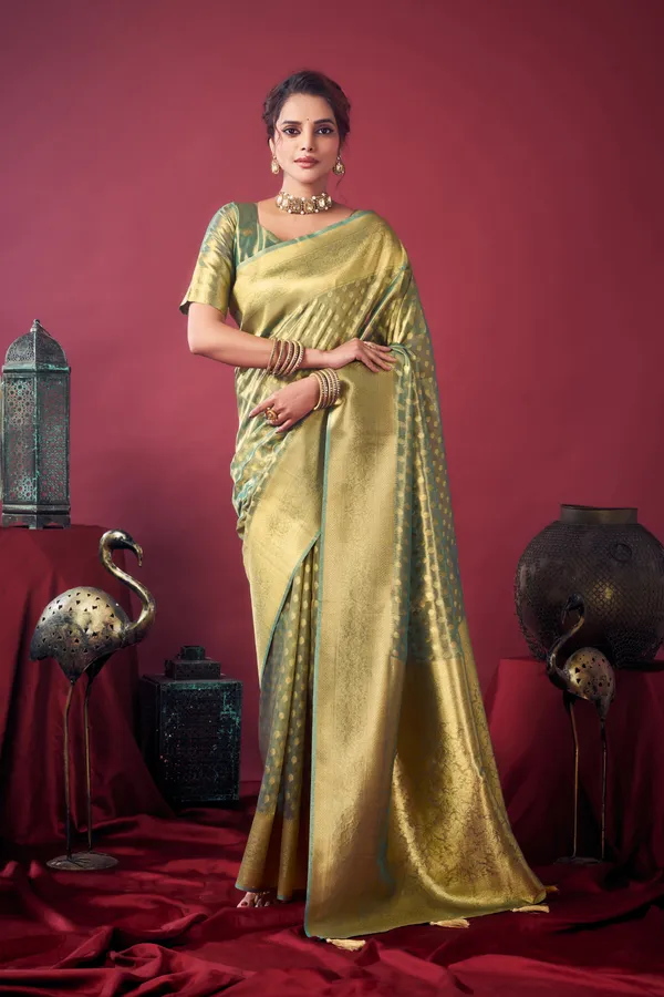 Green_Tissue_Silk_Saree_With_Zhallar_For_Women