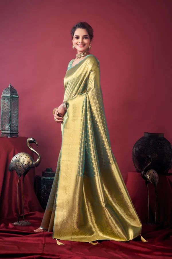 Green_Tissue_Silk_Saree_With_Zhallar_For_Women