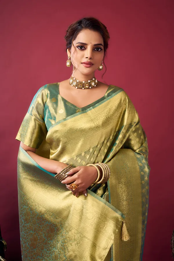 Green_Tissue_Silk_Saree_With_Zhallar_For_Women