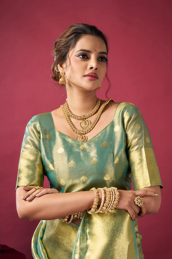 Green_Tissue_Silk_Saree_With_Zhallar_For_Women