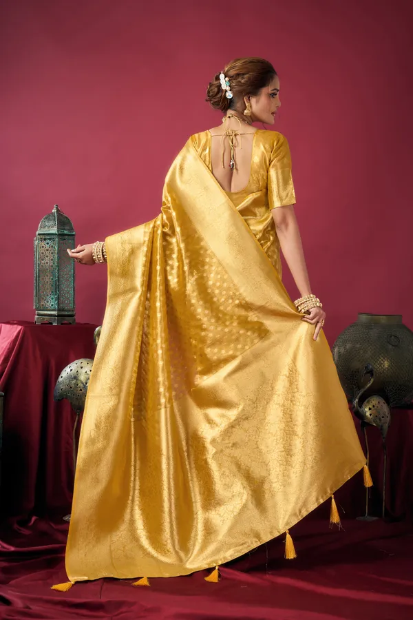 Yellow_Tissue_Silk_Saree_With_Zhallar_For_Women