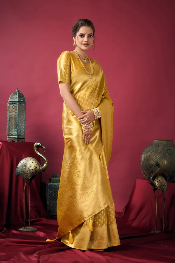 Yellow_Tissue_Silk_Saree_With_Zhallar_For_Women