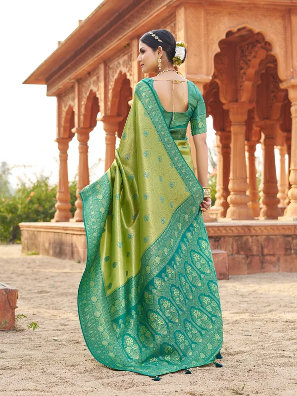 Green_Soft_Banarasi_Silk_Saree_With_Zhallar_For_Women