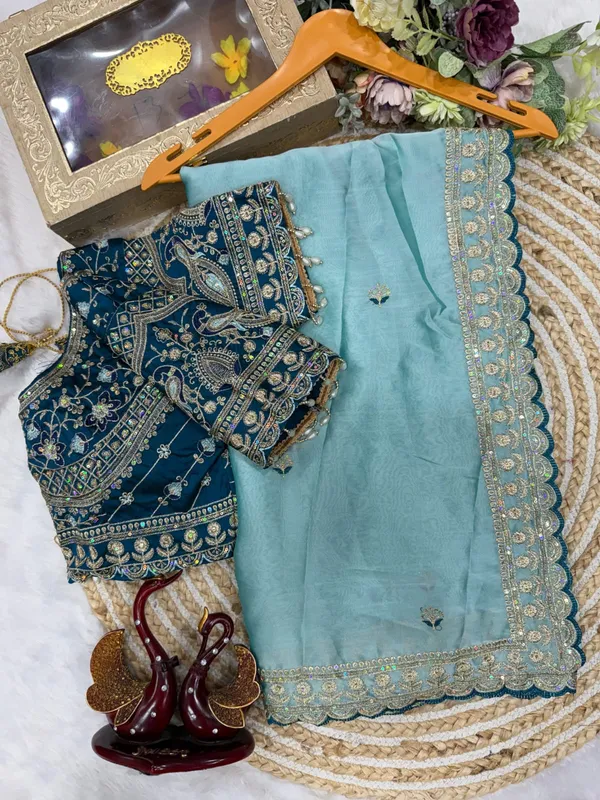 Sky_Blue_Georgette_Embroidered_Saree_With_Blouse_For_Women