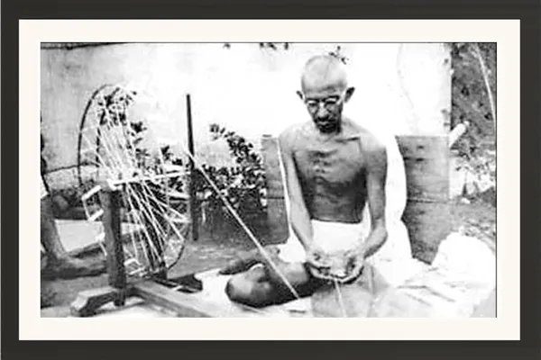 Mahatma_Gandhi_Photo_Frame_Without_Glass_–_Charkha_Spinning_Black_&_White_Wall_Art_for_Home_&_Office
