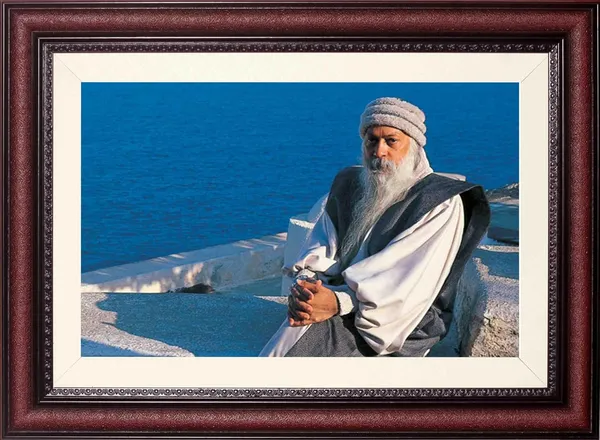 Acharya_Rajneesh_Osho_Seaside_Seated_Photo_Frame_Without_Glass_|_A_Pause_Above_the_Waves