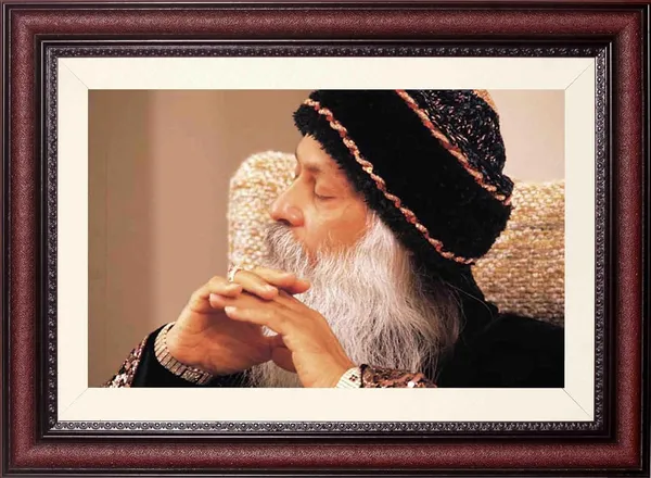Acharya_Rajneesh_Osho_Contemplative_Close-Up_Without_Glass_|_A_Moment_of_Thought_Frame