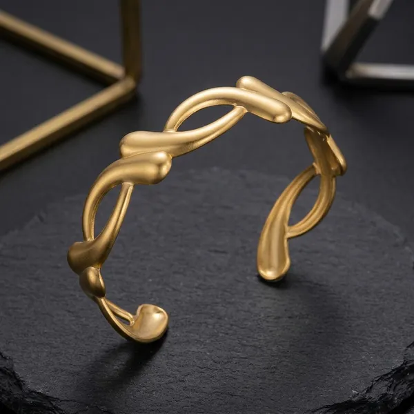Golden_Steel_Geometric_Twisted_Cuff_Bracelet_For_Unisex