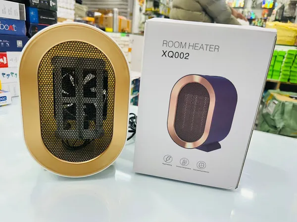 Xq002_Compact_Room_Heater_With_Mesh_Grill
