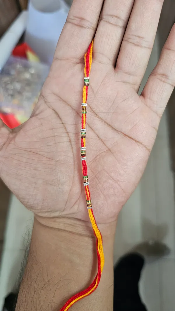 Red_Yellow_Thread_Rakhi_With_Silver_Beads_Brother_Pack_Of_5
