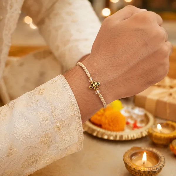 Gold_Tone_Ganesh_Charm_Braided_Thread_Rakhi_Pack_Of_3