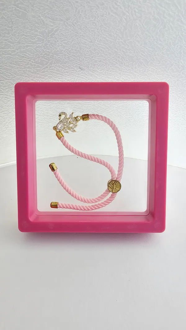 Pink_Thread_Swan_Charm_Adjustable_Rakhi