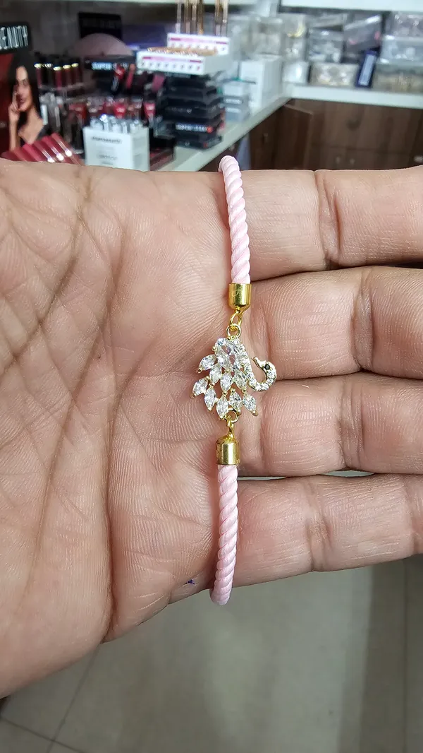 Pink_Thread_Swan_Charm_Adjustable_Rakhi