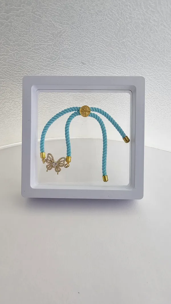 Turquoise_Cord_Gold_Toned_Butterfly_Charm_Rakhi