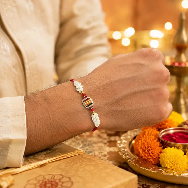White_Pearl_Beaded_Rakhi_With_Red_Thread