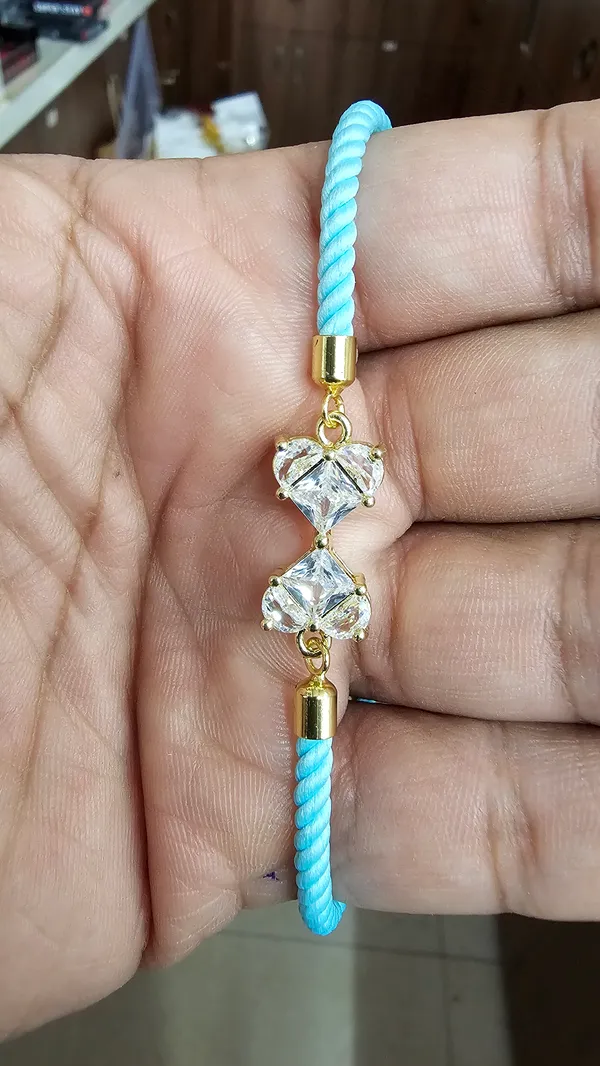 Blue_Cord_Gold_Toned_Crystal_Charm_Adjustable_Rakhi