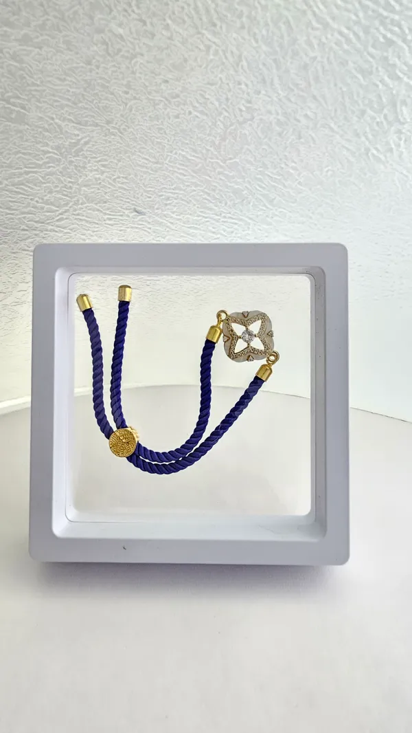 Blue_Cord_Gold_Clover_Charm_Adjustable_Rakhi