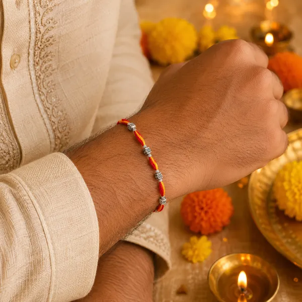 Red_Yellow_Twisted_Thread_Rakhi_With_Silver_Beads_Pack_Of_3