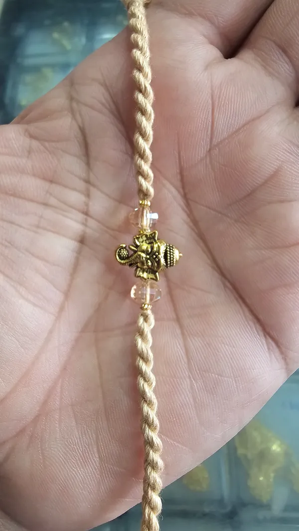 Gold_Tone_Ganesh_Charm_Braided_Thread_Rakhi_Pack_Of_3