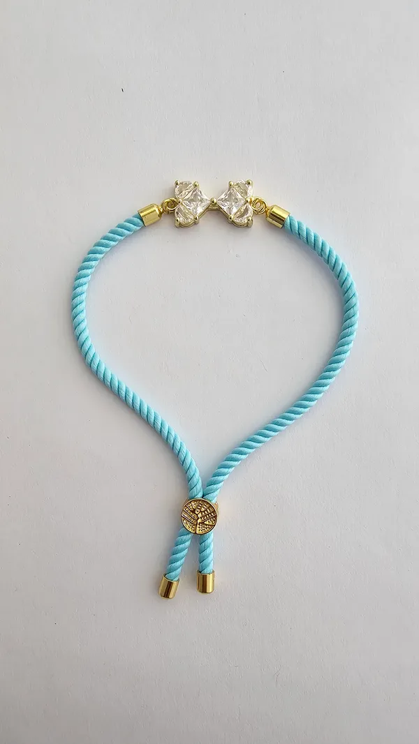 Blue_Cord_Gold_Toned_Crystal_Charm_Adjustable_Rakhi