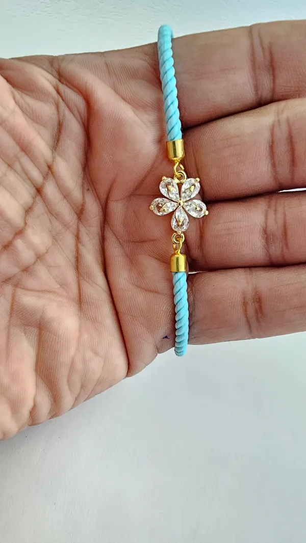 Blue_Cotton_Rope_Crystal_Flower_Charm_Rakhi