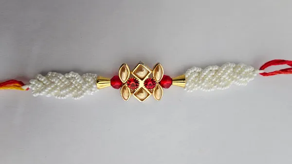 Pearl_Beaded_Golden_Floral_Rakhi_With_Red_Stones