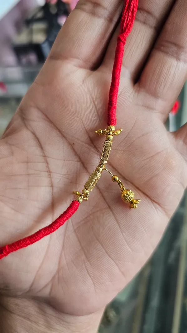 Gold_Plated_Sword_Charm_Red_Thread_Rakhi_Rakhi_Pack_Of_4