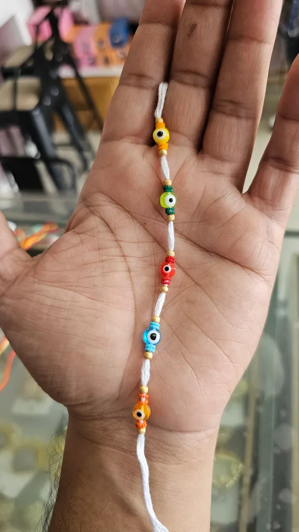 Multicolor_Evil_Eye_Beaded_White_Thread_Rakhi_Pack_Of_5
