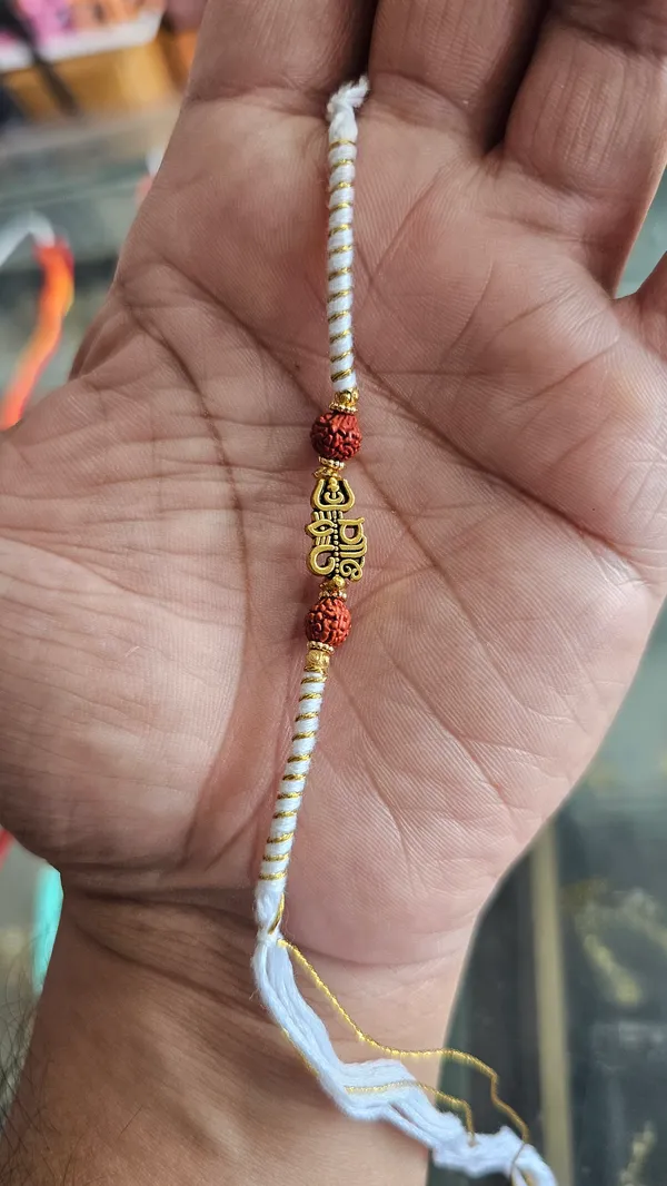 White_Beaded_Rakhi_With_Golden_Centerpiece_Brother_Pack_Of_3