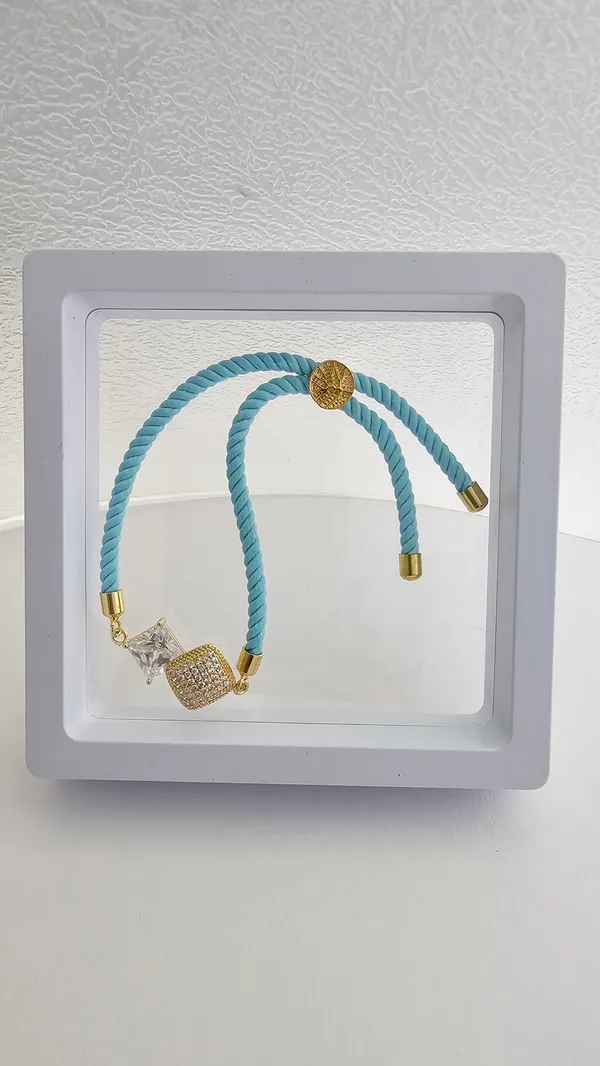 Turquoise_Corded_Gold_Studded_Charm_Rakhi