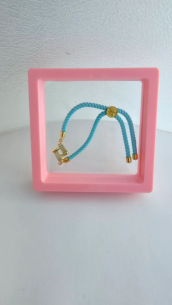 Turquoise_Cord_Gold_Charm_Adjustable_Rakhi