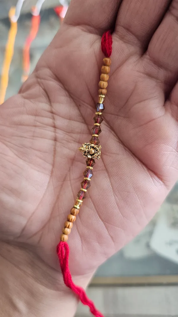 Golden_Beaded_Rakhi_With_Red_Thread_Brother_Pack_Of_3