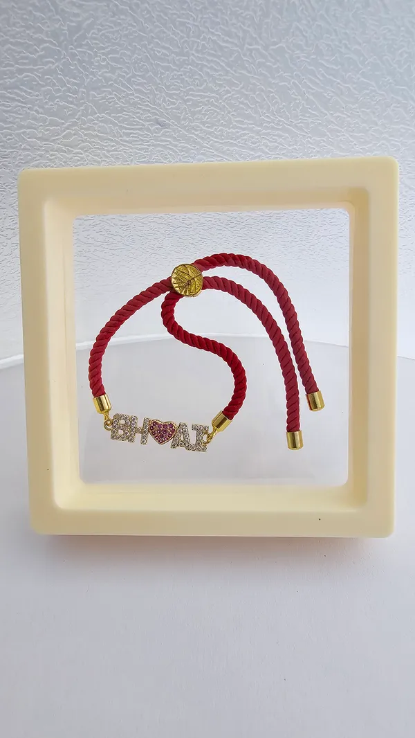 Red_Thread_Bhai_Rakhi_With_Studded_Heart_Pendant