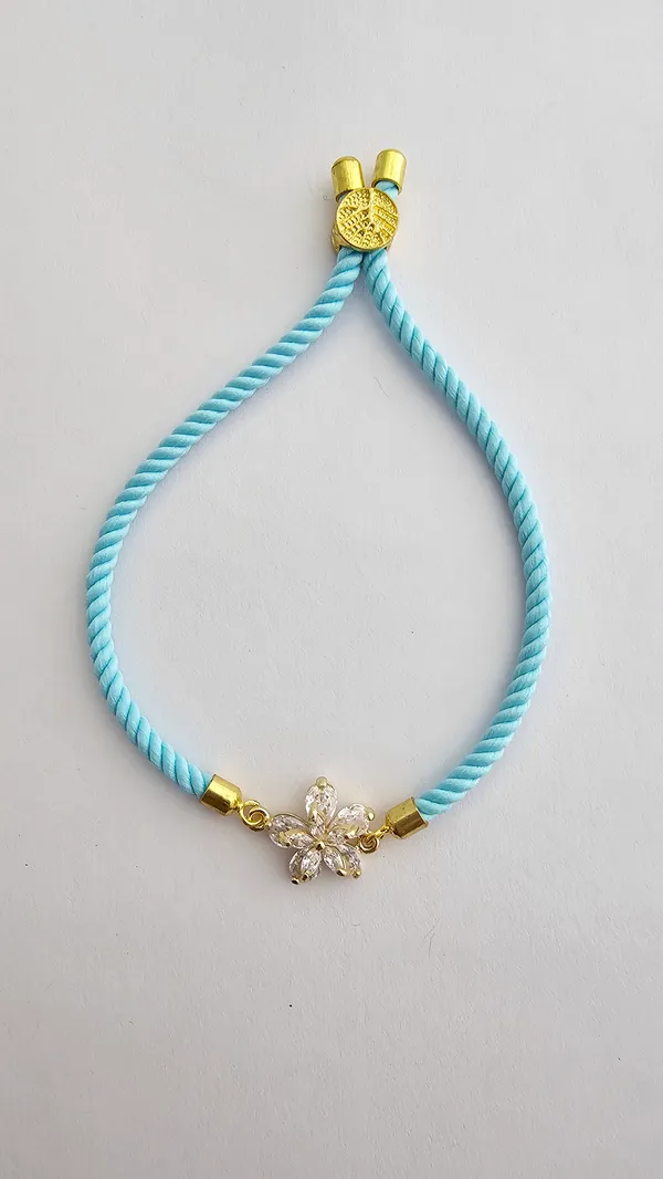 Blue_Cotton_Rope_Crystal_Flower_Charm_Rakhi