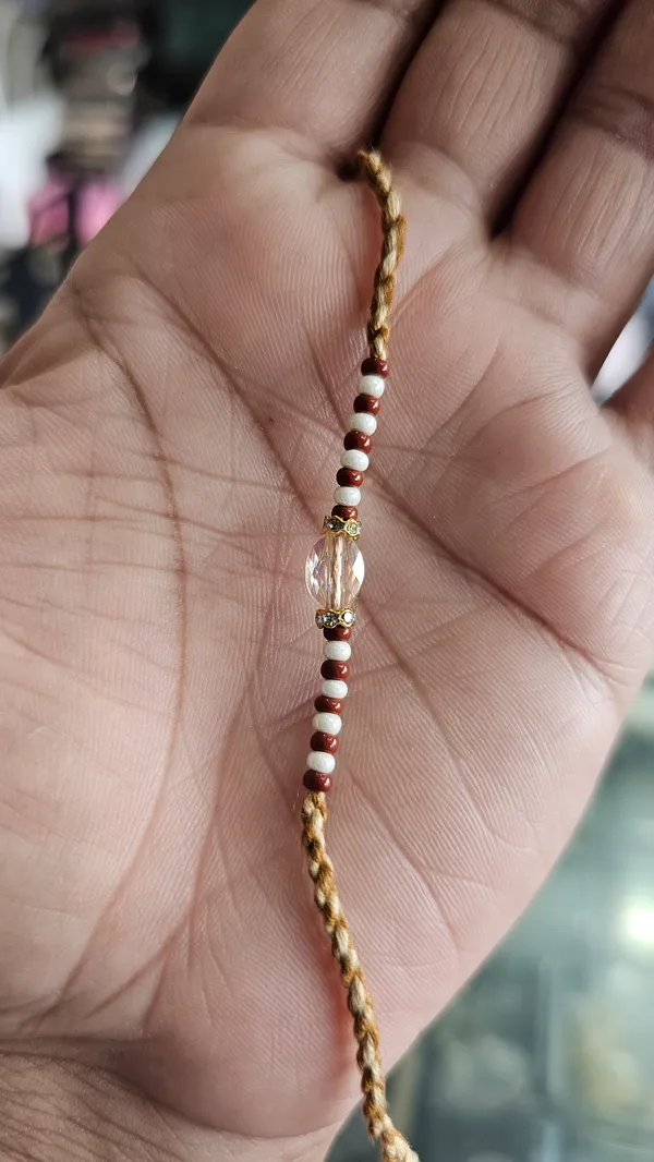 Gold_Plated_Twisted_Chain_Rakhi_With_Beaded_Center_Design_Pack_Of_6