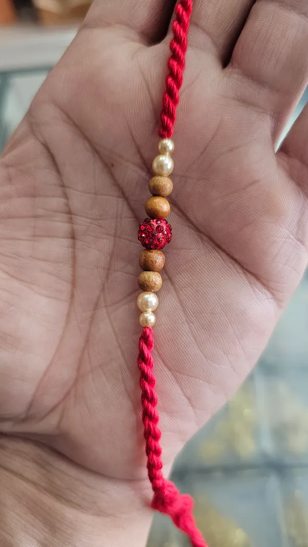 Red_Thread_Beaded_Rakhi_With_Golden_And_Crystal_Embellishments_Pack_Of_5