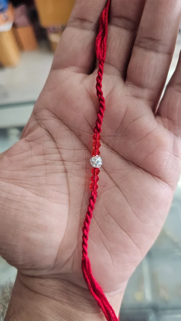 Red_Thread_Rakhi_With_Silver_Heart_Charm_Pack_Of_5