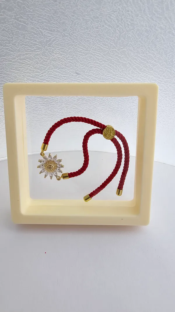 Red_Cord_Gold_Toned_Sunflower_Charm_Rakhi