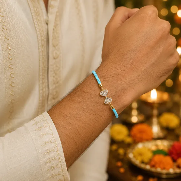 Blue_Cord_Gold_Toned_Crystal_Charm_Adjustable_Rakhi