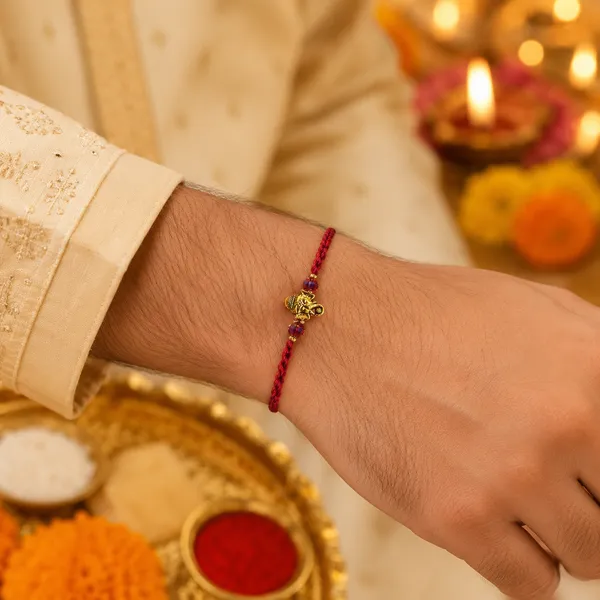 Red_Braided_Thread_Rakhi_With_Golden_Ganesha_Charm_Pack_Of_3