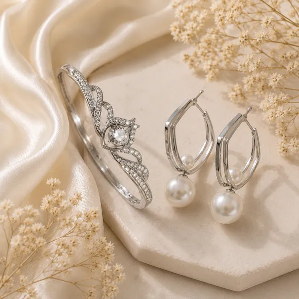 Silver_Crystal_Studded_Crown_Design_Bracelet_For_Women_+_Silver_Geometric_Hoop_Earrings_With_Grey_Pearl_Drops