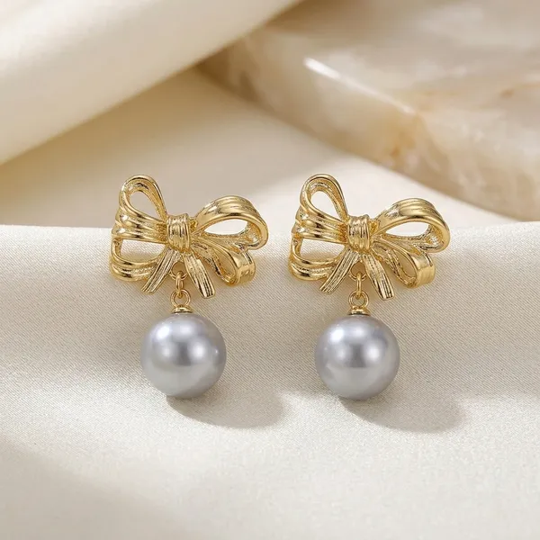 Gold_Metal_Bow_Pearl_Drop_Earrings_For_Women