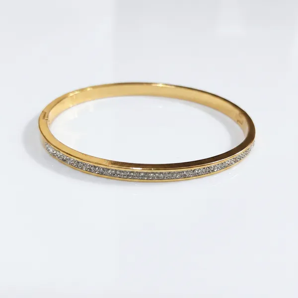 Gold_slim_hinged_bangle_-_Hinged_bangle_-_Single_row_pave_CZ_stones