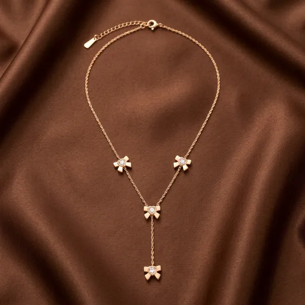 Gold_Lariat_Bow_Crystal_Charm