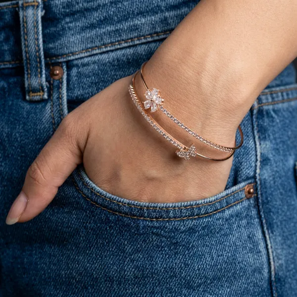 Rose_gold_open_cuff_double_bangle_-_Open_cuff_-_Diamond-cut_texture+butterfly_charm