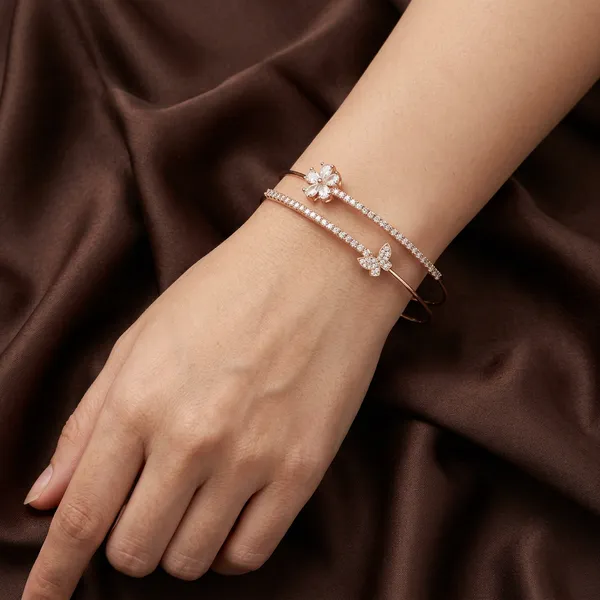 Rose_gold_open_cuff_double_bangle_-_Open_cuff_-_Diamond-cut_texture+butterfly_charm