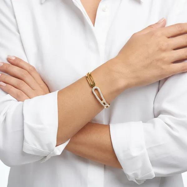 Gold_geometric_open-frame_bangle_-_Hinged_bangle_-_Double_CZ_bar+cut-out_design